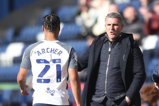 Preston North End manager Ryan Lowe congratulates Cameron Archer after he is substituted in the closing minutes of the victory over Queens Park Rangers