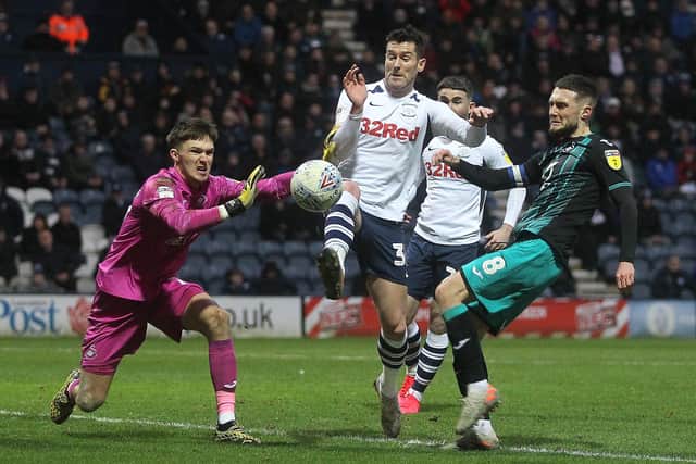 Freddie Woodman in action at Deepdale, saving at the feet of David Nugent.