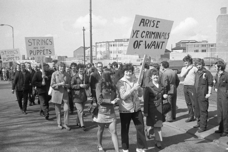Hundreds of striking BAC workers formed up three abreast in a column of hundreds of yards long for their protest march through the centre of Preston. The column bedecked with banners proclaiming in a mixture of Lancashire dialect and economic fact moved away slowly from Cheviot Street. The procession, estimated by the organisers at 2,500 to 3,000 strong, snaked slowly towards the town centre flanked by police motor cyclists