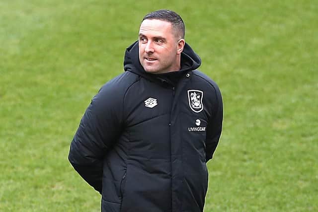 Mark Fotheringham, manager of Huddersfield Town inspects the pitch prior to the match between Preston North End and Huddersfield Town