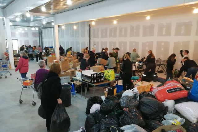 Volunteers sorting the many items