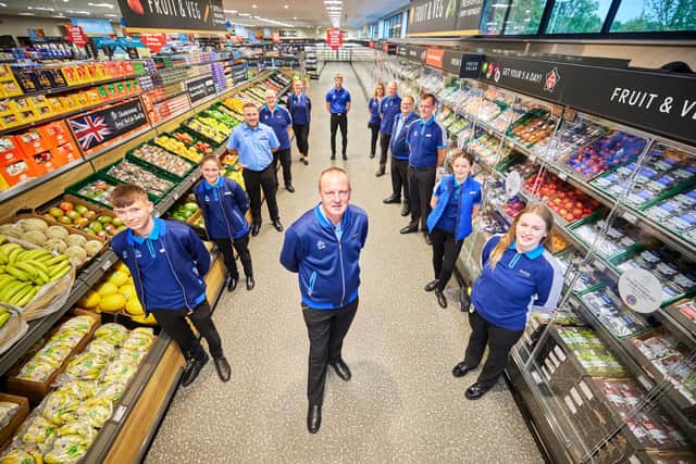 Aldi Tarleton near Preston grand opening Store Manager Tony Breen and Team GB Athlete: Anyika Onoura retired British sprint track and field athlete and SportsAid Athlete: Adelaide Barnes GB Taekwondo