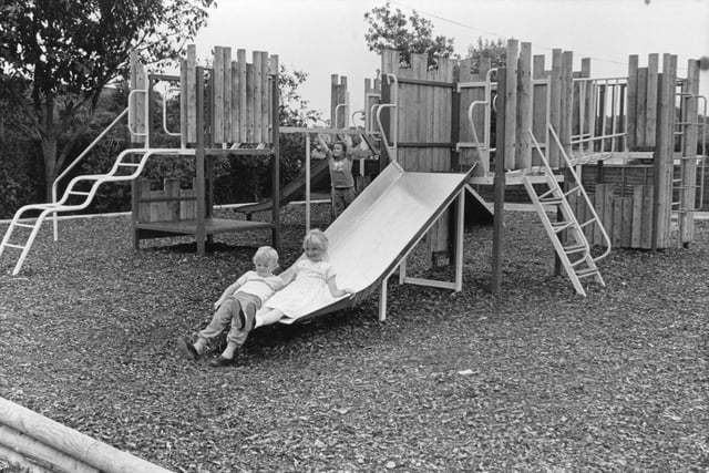 This looks fun - but does anyone remember how hot those metal slides got in sunny weather? This picture was taken in 1987