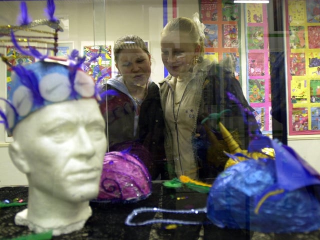 Shaunna Sutton,13 (left), and Tanya McCrudden,14, both from Ribbleton Hall High School, look at their work at the launch of the Image and Identity schools and national children's group exhibition back in 2004
