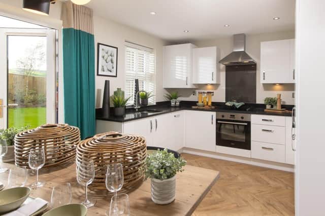 A kitchen and dining area in a typical home at Brun Lea Heights