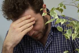 There will be a public meeting in Burnley for anyone impacted by no-win, no-fee cavity wall insulation claims following the collapse of SSB Law. Credit: Marisa CashillStock photo of a man feeling despair.