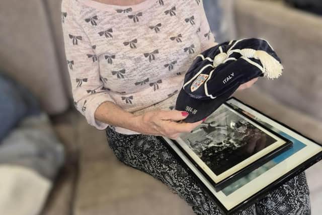 Residents admiring Paul Williams players cap and photo's