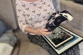 Residents admiring Paul Williams players cap and photo's