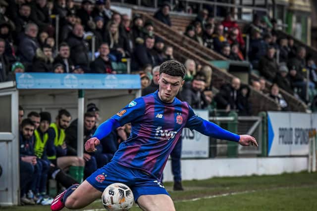Connor Barratt fires in a cross