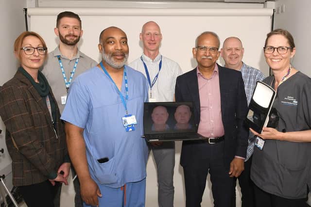 Lucy Tinniswood (front left) with Mr Srinivasan (next to her), Mr Ekwobe and imaging team