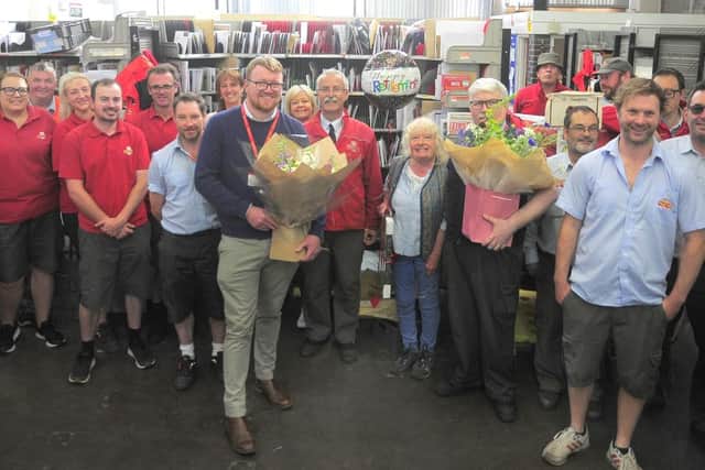 Louise Williams with all her colleagues from Royal Mail at her retirement send-off.