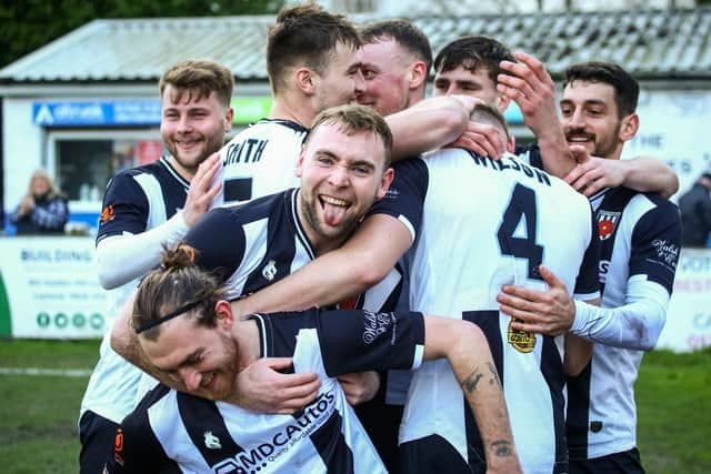 Jon Ustabasi, far right, scored a dramatic late winner for Chorley (photo: Stefan Willoughby)