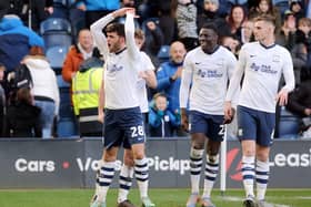 Preston North End's Tom Cannon (left) celebrates with teammates after scoring his side's second goal
