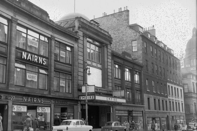 The Empire Theatre in 1961, alongside Nairns Furniture Store.