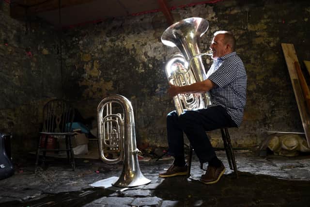 Photo Neil Cross; Brian Law, chairperson of the Longridge Band committee, appealing for junior members to come and play the rare tubas.
