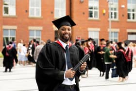 Hamza Hassan in his academic cap and gown.