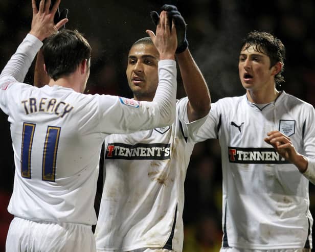 Leon Clarke celebrates scoring for Preston with Keith Treacy and Adam Barton