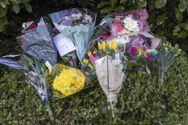 Floral tributes at the scene (Credit: Jason Roberts/PA Wire)