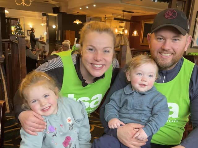 Aaron Holt with his wife Laura and their children Jonah and Ruby. Jonah has a rare condition known as TSC and this year Aaron is taking on multiple 10k challenges in a bid to raise £10,000 for the charity that supports them