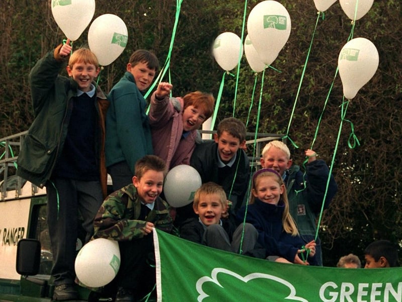 The children of St. Mary's Primary School, Leyland, with the Green Flag that will fly over Worden Park, Leyland