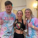 New British champion Eleanor Fellows (centre) with head coaches Alice and Tommy Johnson
