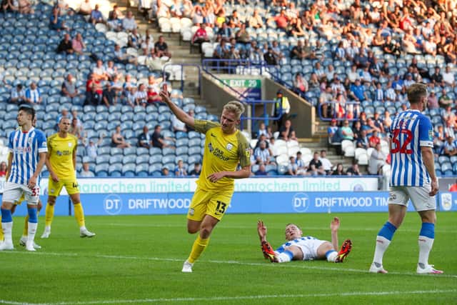 Preston North End's Ali McCann celebrates scoring against Huddersfield Town.