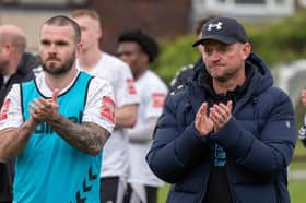 Bamber Bridge boss Jamie Milligan, right
