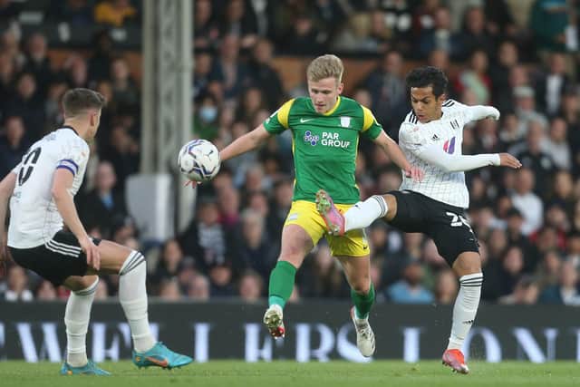 Preston North End midfielder Ali McCann battles with Fulham's Fabio Carvalho at Craven Cottage