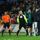 Swansea City's Joe Allen and Preston North End manager Ryan Lowe clash in the dying moments of the game