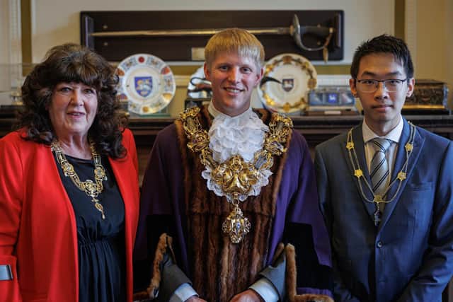 Preston's new mayor for 2022/23, Neil Darby (centre), with his mayoress, Cllr Pauline Brown, and his partner and mayor's consort, Dan Leung (image: Michael Porter Photography)