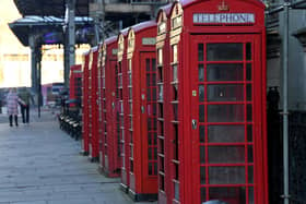 The instantly-recognisable row of red phone boxes on Preston's Market Street