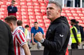 Preston North End's head coach Ryan Lowe celebrates victory at Stoke City Photo: Andrew Kearns/CameraSport