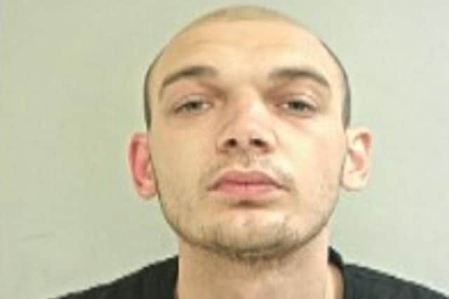 Cameron Parkinson is wanted in connection with an investigation into a kidnapping in Preston (Credit: Lancashire Police)