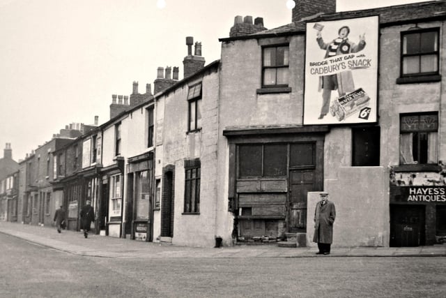 This image of the junction of Moor Lane and North Street was taken in 1959. The photographer is standing in front of the Windmill Inn. These properties would soon be swept away to be replaced by the Moor Lane Flats development
