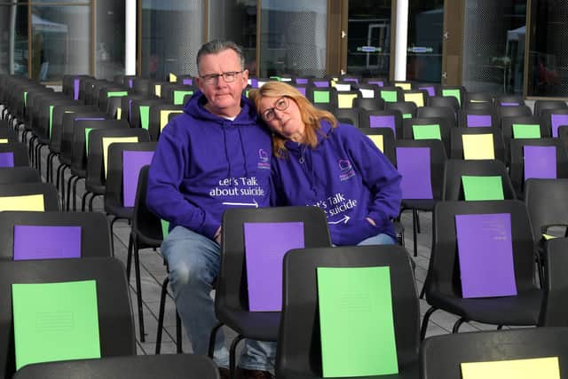 Sharon and Paul, parents of Mary O'Gara in the empty chairs outside UCLan