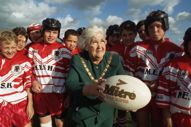 Young rugby players are celebrating the competion of a £150,000 improvement scheme at their home ground at Moss Side Recreation Area. Pictured: Coun Betty Greenland starts the ball rolling for the Leyland Warriors