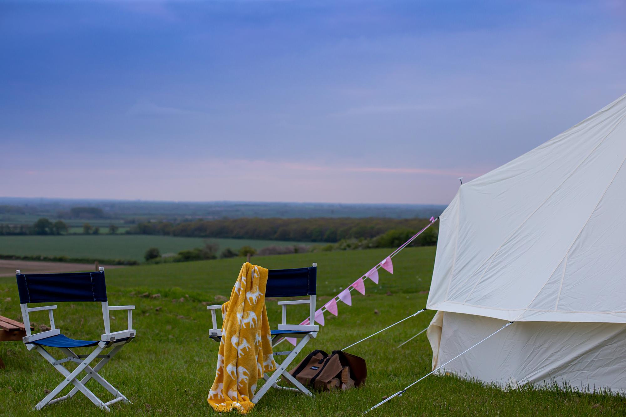 Relax and unwind on a glamping staycation with castle backdrop in the ...