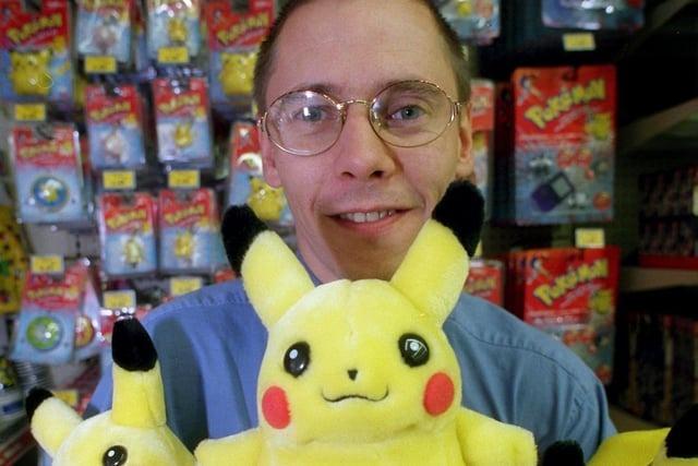 In 1999 Pokemon had arrived. Toys R Us store manager Jim Broadbent is pictured with the Pokemon toys available at the store in Deepdale, Preston