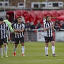 Chorley's players were inconsolable at the final whistle after losing 1-0 to Brackley Town in the play-off semi-final (photo: David Airey/dia_images)