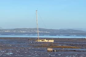 Lancaster City Council want to trace the owner of this yacht which is sinking in Morecambe Bay.