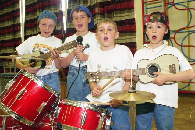 Meet the musical maestros! Pupils Alex Titterington, Christopher Tiley, Niall Smith and a mystery band member hit a high note during a talent show held at Queen's Drive County Primary School, Fulwood, Preston