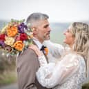 Kirsty and Joe Brunt on their wedding day at The Alma Inn in Colne last year. The couple won the dream day in a competition to find the most deserving recipient of the £10,000 wedding package.