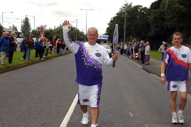 Don Parker from Preston carries the Queen's Jubilee Baton as it makes it's way along Riversway in Preston - this was in celebration of the Queen's Silver Jubilee