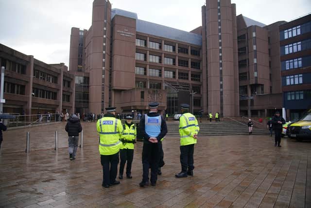 Heavy police presence outside Liverpool Crown Court where Axel Rudakubana, 18, is charged with three counts of murder, 10 attempted murders and possession of a knife, after a stabbing attack on a Taylor Swift-themed children's holiday club class in Southport, Merseyside on July 29, 2024. Peter Byrne/PA Wire