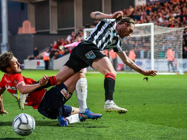 Billy Whitehouse tries to make progress down the wing against York (photo: Stefan Willoughby)