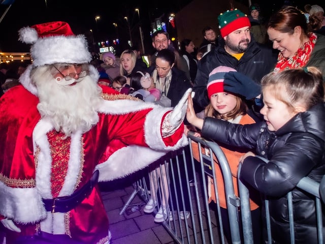 Father Christmas receives a warm welcome to the Padiham Christmas lights switch on