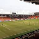 Police are looking into allegations of racist chanting by Blackpool fans during the home match with Preston North End