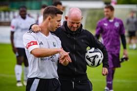 Bamber Bridge boss Jamie Milligan, right, is looking to steer his team away from danger (photo: Ruth Hornby)
