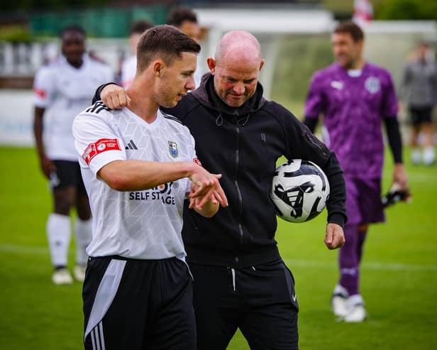 Bamber Bridge boss Jamie Milligan, right, is looking to steer his team away from danger (photo: Ruth Hornby)