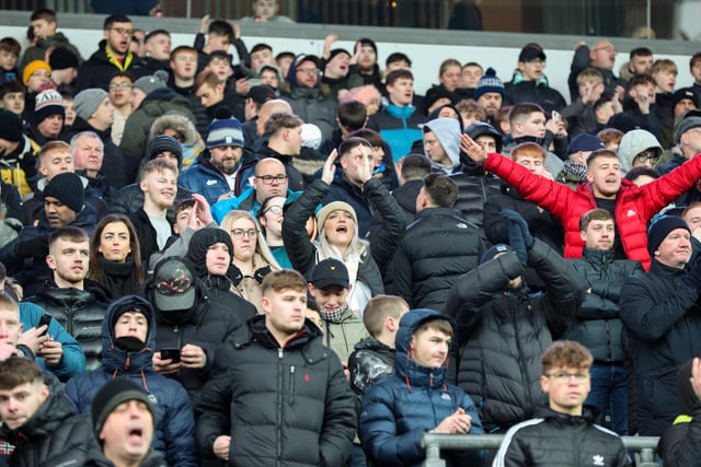 Preston North End fans watch on.